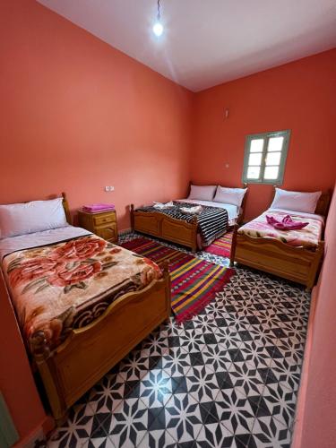 Cama o camas de una habitación en Hotel Izlane
