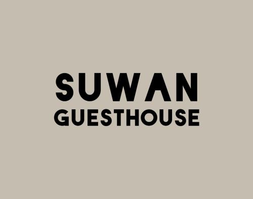 a sign that reads swan guest house at SUWAN Guesthouse A07 - 2BR Apartment with Free Wifi Near Kajang 2 in Kajang