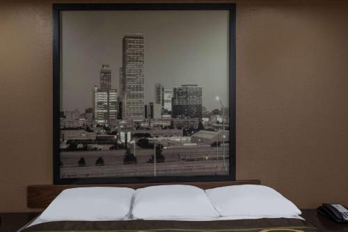 a black and white picture of a city at Super 8 by Wyndham Tulsa/Arpt/St Fairgrounds in Tulsa