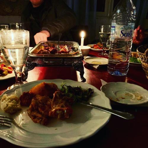 a table with a plate of food on a table at ferme Walila in Douar Doukkara