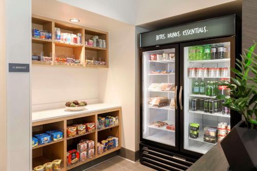 a refrigerator filled with lots of food and drinks at Hyatt House Davis in Davis