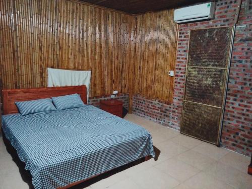 Uma cama ou camas num quarto em Ninh Binh Bungalow Homestay