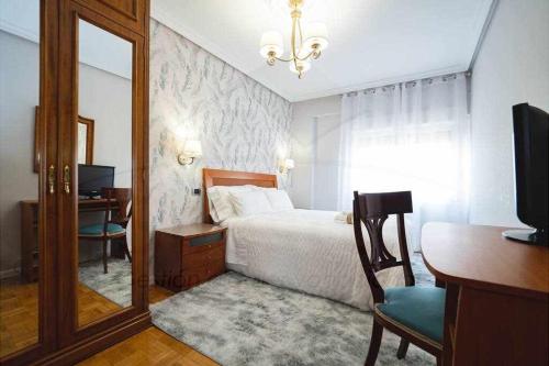 Postel nebo postele na pokoji v ubytování Ezcurdia Apartamento