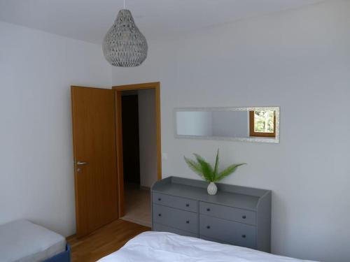 Postel nebo postele na pokoji v ubytování Forest Green Pohorje Apartment