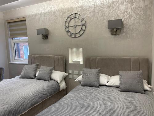 Postel nebo postele na pokoji v ubytování Park Avenue Hotel