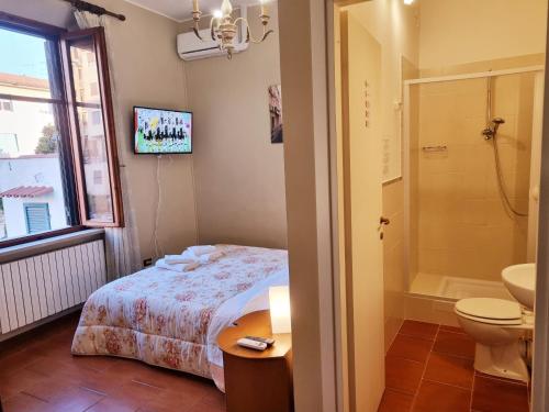 Ένα ή περισσότερα κρεβάτια σε δωμάτιο στο Villa Rismondo