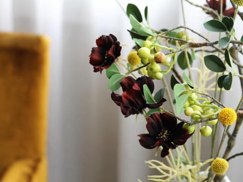 a bouquet of flowers in a vase at Blanch House in Brighton & Hove