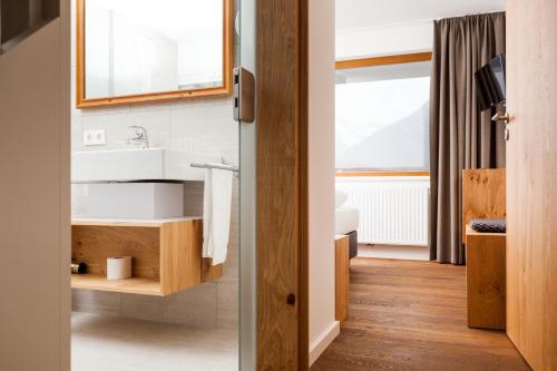 Ett badrum på Valschena Appartements