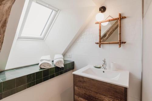 Koupelna v ubytování Gîte de la Garenne - Cottage chaleureux avec piscine
