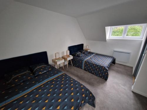 Ένα ή περισσότερα κρεβάτια σε δωμάτιο στο Haut standing Proche zone industrielle