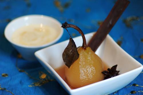 a bowl of food with a pear and a bowl of dipping sauce at The Retreat at Froog Moore Park in Tamworth