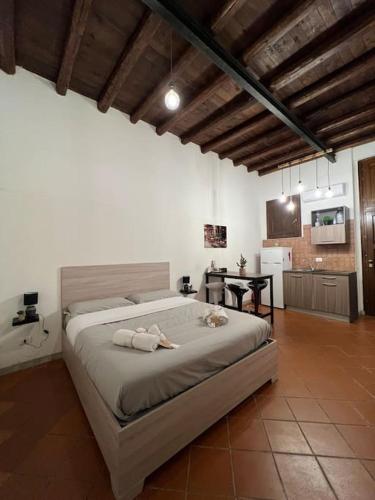 A bed or beds in a room at Central Cathedral Apartment