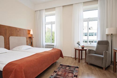Postel nebo postele na pokoji v ubytování Elite Stadshotellet Växjö