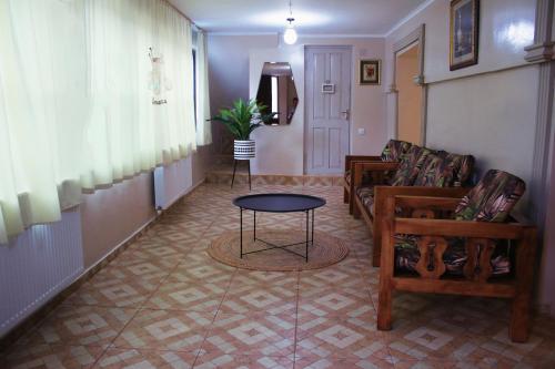Coin salon dans l'établissement Guesthouse of Manoni Ratiani