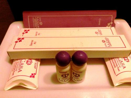 a table topped with two chopsticks and a box with chopsticks at La Casa in Haridwār