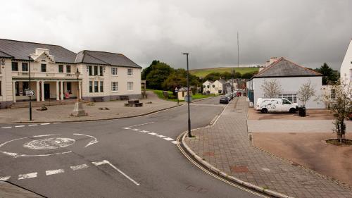 an empty street in a small town with buildings at The Ramblers' Rest - Princetown in Princetown