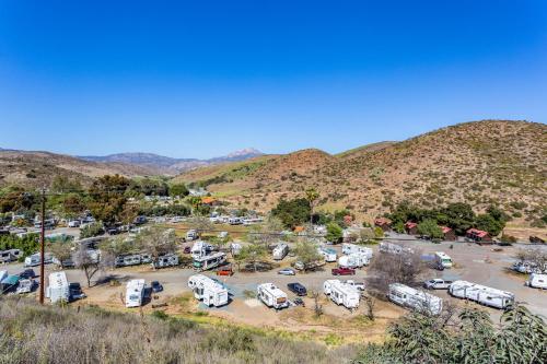 an aerial view of a parking lot with mountains in the background at Pio Pico Camping Resort One-Bedroom Cabin 14 in Jamul