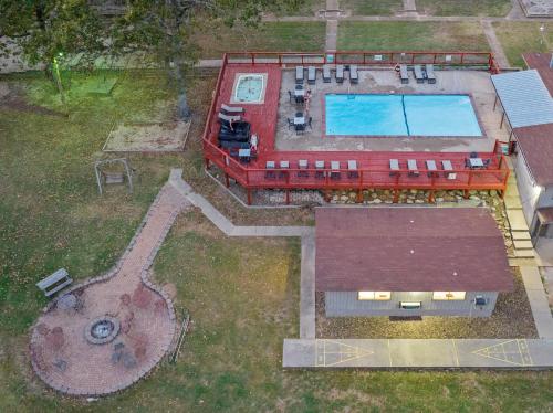 an aerial view of a swimming pool and a house at Table Rock Resorts at Indian Point in Branson