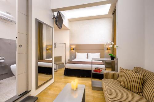 Ένα ή περισσότερα κρεβάτια σε δωμάτιο στο Le Camere Dei Conti - Guest House