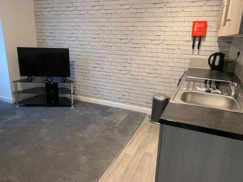 Una cocina o cocineta en 1. Delightful Apartment