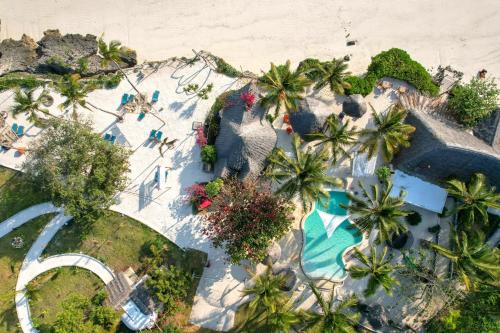an overhead view of a resort with a pool and a beach at Aya Beach Resort in Kizimkazi