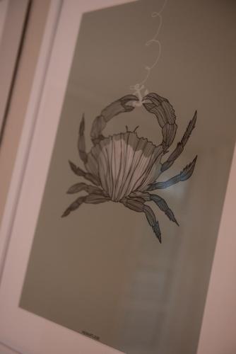 a drawing of a flower on a wall at Das Anni's in Wangerland