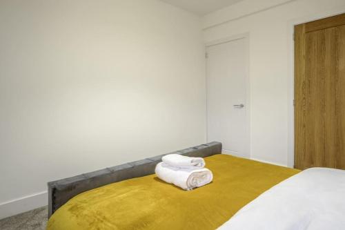 Ένα ή περισσότερα κρεβάτια σε δωμάτιο στο Vion Apartment- Westerton