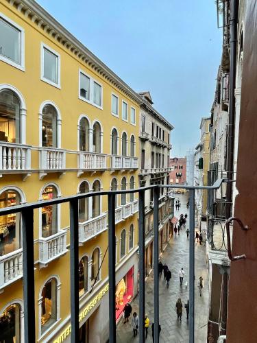 a view from a balcony of a street with buildings at Studio di Lilli in Venice