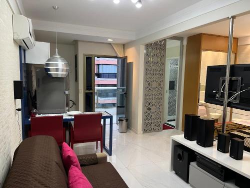 Η κουζίνα ή μικρή κουζίνα στο Loft com vista incrível para a Praia da Costa!