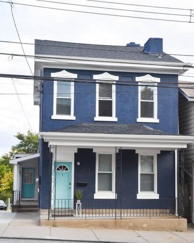 a blue house with a blue door on a street at Perfect Mount Washington Home Walkable w Parking in Pittsburgh