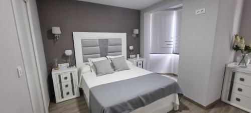 Giường trong phòng chung tại Virrey del Pino - Apartamento en Baena