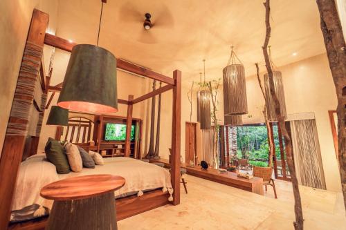 Postel nebo postele na pokoji v ubytování Oriundo Luxury Nature Villas
