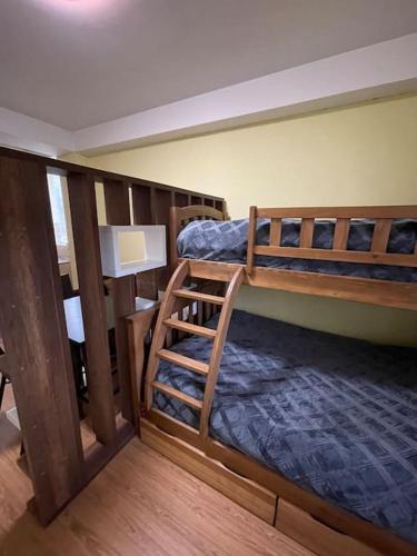 a room with two bunk beds in a room at Apartment in Gudauri in Gudauri
