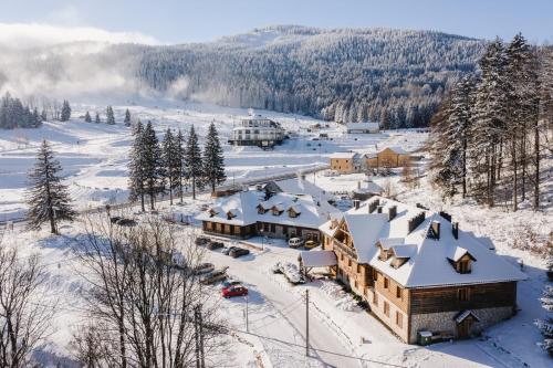 an aerial view of a resort in the snow at Dom Puchacza w Lądku-Zdroju in Lądek-Zdrój