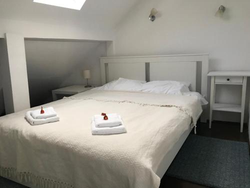 Кровать или кровати в номере Centrum