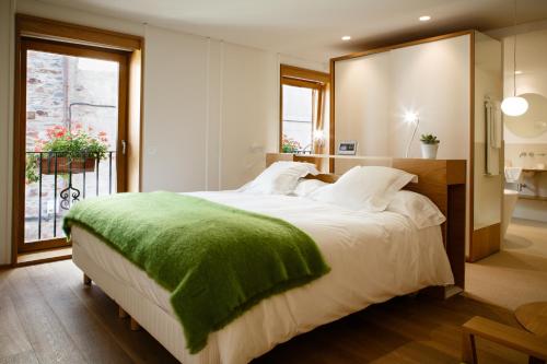 Cama o camas de una habitación en Echaurren Hotel Gastronómico