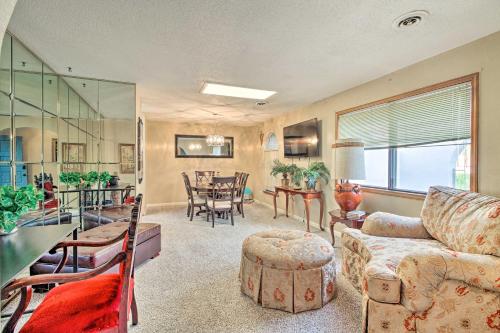 a living room with a couch and a table at Rio Rancho Home Less Than 14 Mi Old Town Albuquerque! in Rio Rancho