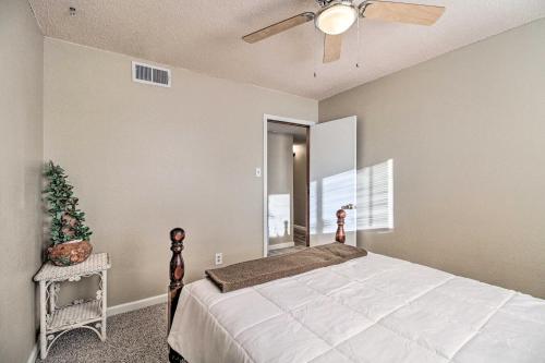 a bedroom with a bed and a ceiling fan at Rio Rancho Home Less Than 14 Mi Old Town Albuquerque! in Rio Rancho