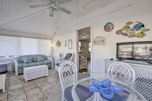 a living room with a table and a couch at Jersey Apt - half Mi to Seaside Heights Beach in Seaside Heights