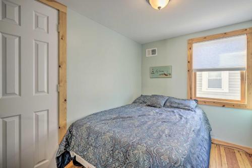 a bedroom with a bed and a window at Jersey Apt - half Mi to Seaside Heights Beach in Seaside Heights