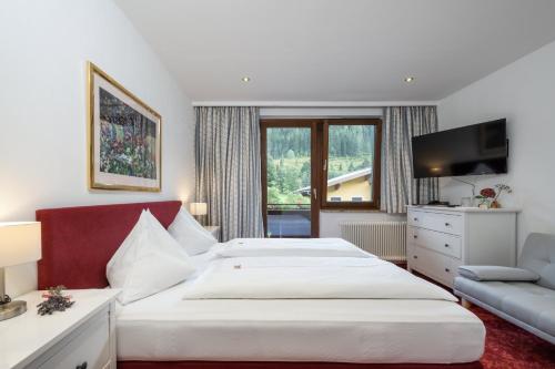 Postel nebo postele na pokoji v ubytování Hotel Gasthof Krahlehenhof