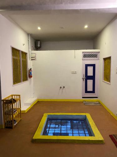 a room with a pool in the middle of a room at Comfort and Cozy in Orchha