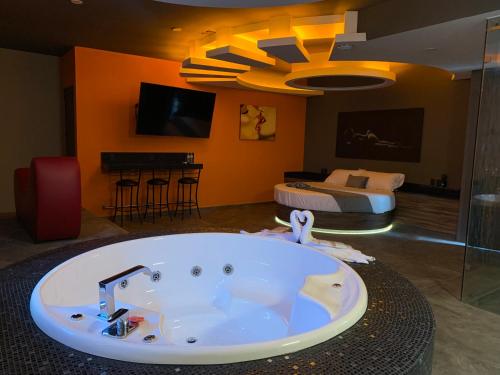TV a/nebo společenská místnost v ubytování Roxy Motel