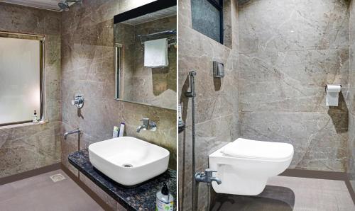 a bathroom with a toilet and a sink and a shower at Treebo Classic Grande, Camp in Pune