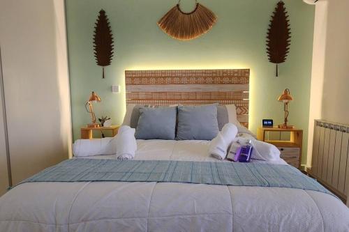 Giường trong phòng chung tại Cenote de Cofico