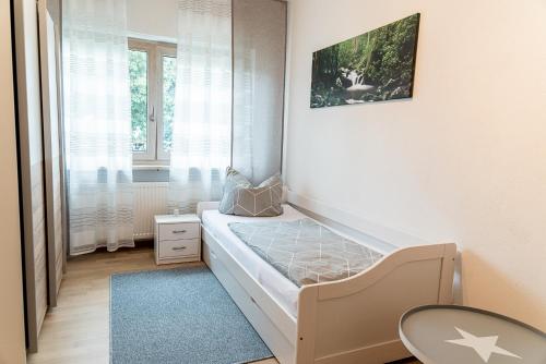 Postel nebo postele na pokoji v ubytování Ferienhaus Pilsting 24-7 checkin