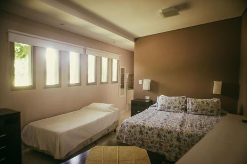 Una cama o camas en una habitación de Cabañas Alto Chañaral