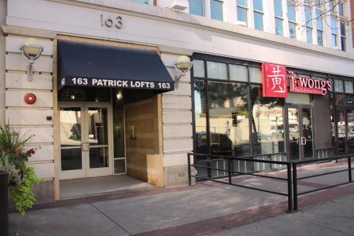 a store front of a building with a sign on it at NEW! Lavish Studio Loft in Central Downtown SLC in Salt Lake City