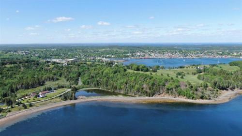an aerial view of a lake with a bridge at Atlantic View Motel in Lunenburg