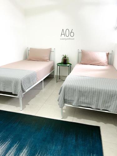 Katil atau katil-katil dalam bilik di SUWAN Guesthouse A06 - 2BR Apartment with Pool Near UKM